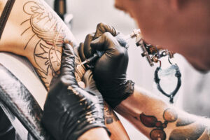 person getting a tattoo
